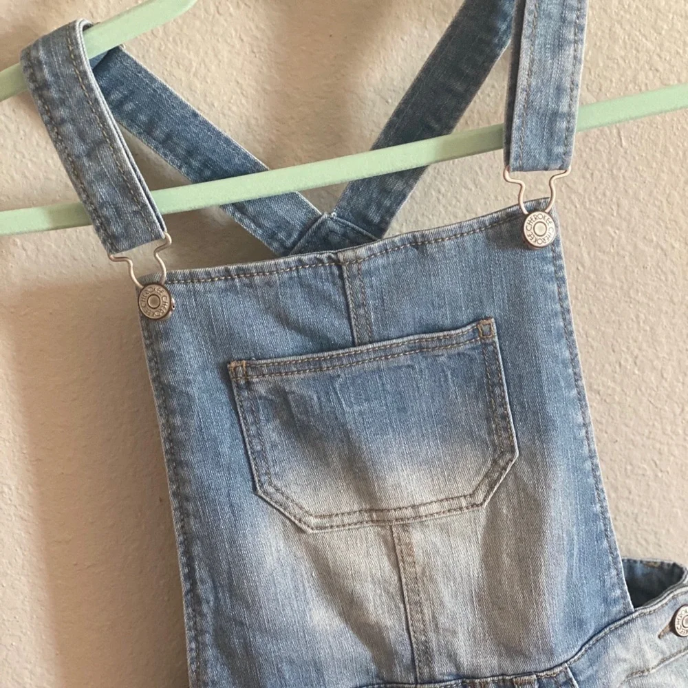 Cherokee Lace Trim Stretch Denim Overall Shorts​​​​​​​​​